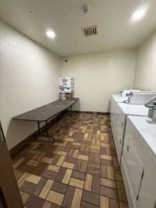 Laundry room view of washers & dryers